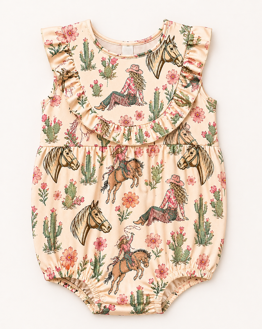 Cream cowgirl and cactus desert infant onesie with ruffle detail