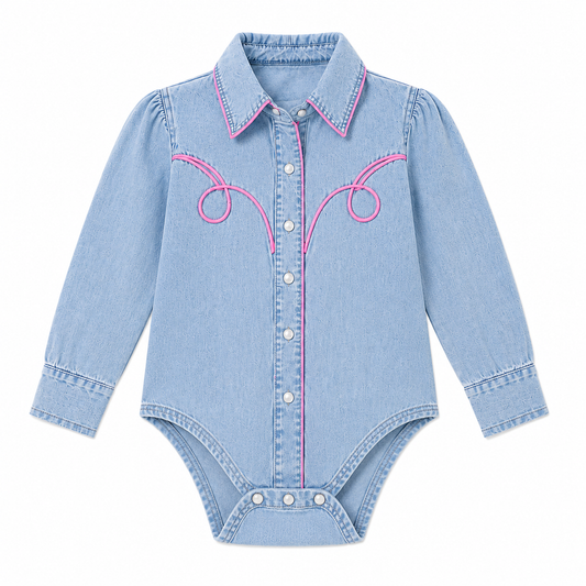 Light blue denim long sleeve pearl snap infant onesie with pink piping detail