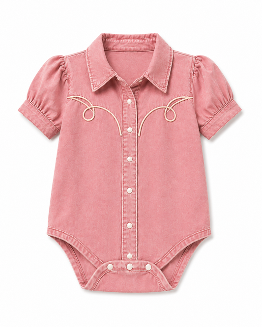 Pink wash denim pearl snap infant onesie with white piping detail