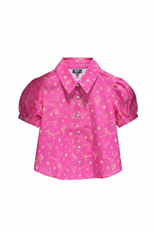A bright pink short-sleeve button-up shirt with a gold western-themed print of stars, horseshoes, and cacti