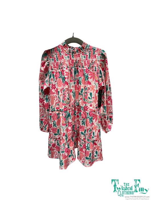 A toddler's smocked dress with a boho western boot pattern, displayed on a white background.