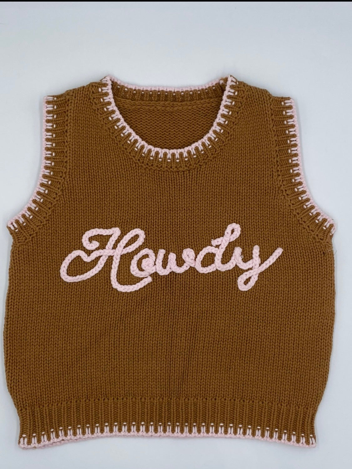 Brown knitted sweater vest with pink Howdy detail